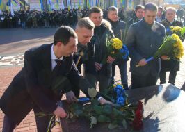 Participants of the ceremony of laying flowers