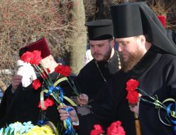 Participants of the ceremony of laying flowers