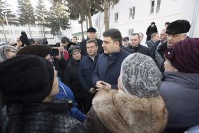 Vladimir Groisman communicates with people