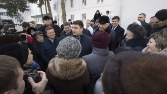 Vladimir Groisman communicates with people