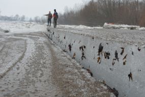 Rescuers blow up the ice on the river