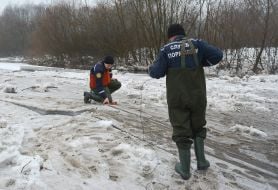 Rescuers blow up the ice on the river