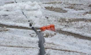 Rescuers blow up the ice on the river