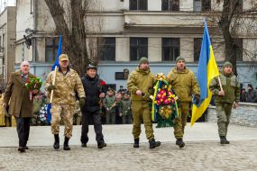Participants of the ceremony of laying flowers