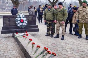 Participants of the ceremony of laying flowers