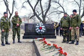 Participants of the ceremony of laying flowers