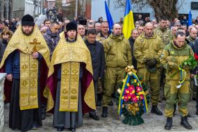 Participants of the ceremony of laying flowers
