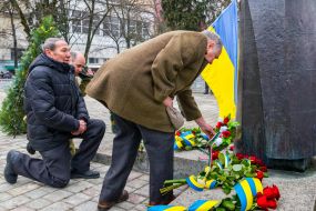 Participants of the ceremony of laying flowers