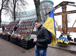 Young man with Ukrainian flag