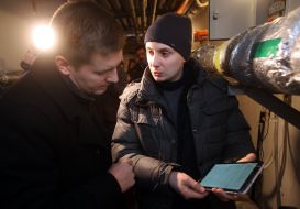 Engineer takes meter readings