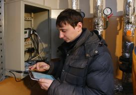 Engineer takes meter readings