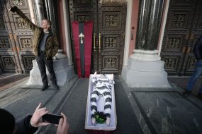  Rubber Doll with a portrait of Gontareva in a coffin 