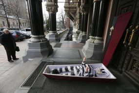  Rubber Doll with a portrait of Gontareva in a coffin 