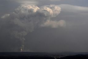 Explosions in a military warehouse near