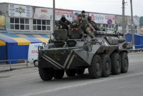 Soldiers in an armored personnel carrier