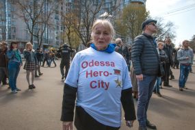 A woman in a shirt with the inscription
