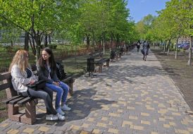Girls sit on the bench