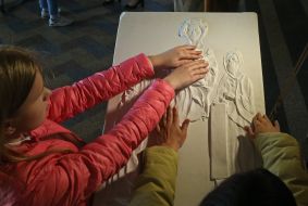 Blind children touching icons