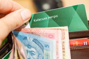 Passenger takes money and travel purse