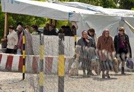 People at the checkpoint of entry and exit "Novotroitskoe"