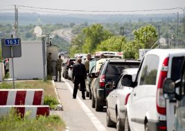 People at the checkpoint of entry and exit "Novotroitskoe"
