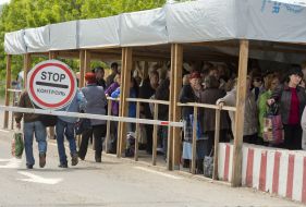 People at the checkpoint of entry and exit "Novotroitskoe"
