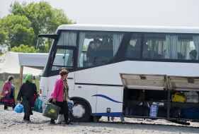 People at the checkpoint of entry and exit "Novotroitskoe"