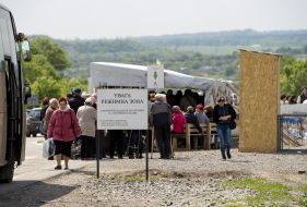 People at the checkpoint of entry and exit "Novotroitskoe"