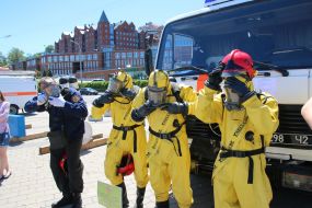 Rescuers in protective suits