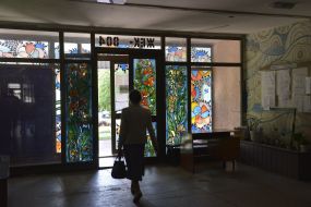 Woman in the housing department building