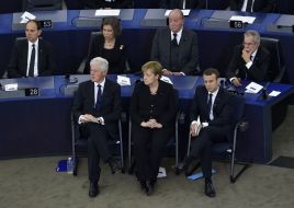 Bill Clinton, Angela Merkel and Emmanuel Macron