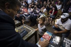 Petro Poroshenko attends presentation of book in "Pizza Veterano"