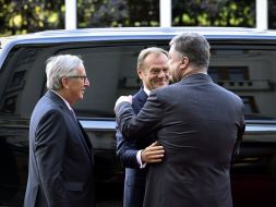 Petr Poroshenko, Donald Tusk and Jean-Claude Juncker