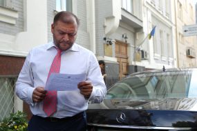 Mikhail Dobkin holds a court order