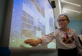 Girl near an interactive whiteboard