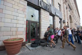 Activists are laying tires near the store "Emporium"