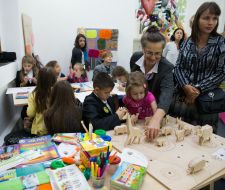 Children play and paint