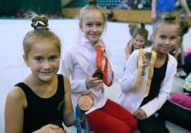 Gymnastics hold medals