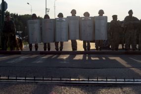 Border guards with shields at the checkpoint "Shegini"
