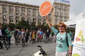 Participant of the flash mob "On a bicycle to work"