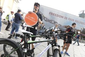 Participant of the flash mob "On a bicycle to work"