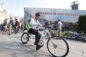 Member of the flash mob "On a bicycle to work"