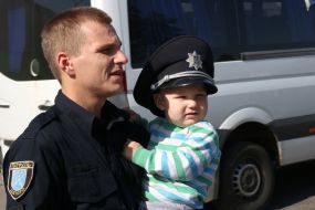 Police officer with his son