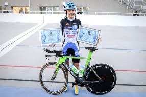 Elena Novikova holds diplomas with confirmation of records