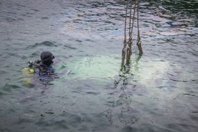 Rise of a sunken car from the sea