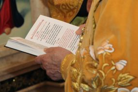 Priest during the prayer