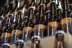 Ukrainian beer with Canadian Prime Minister portrait on bottles