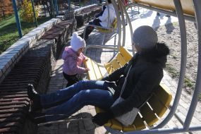 Swings with Petrikov painting