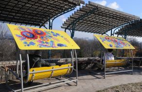 Swings with Petrikov painting