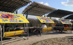 Swings with Petrikov painting